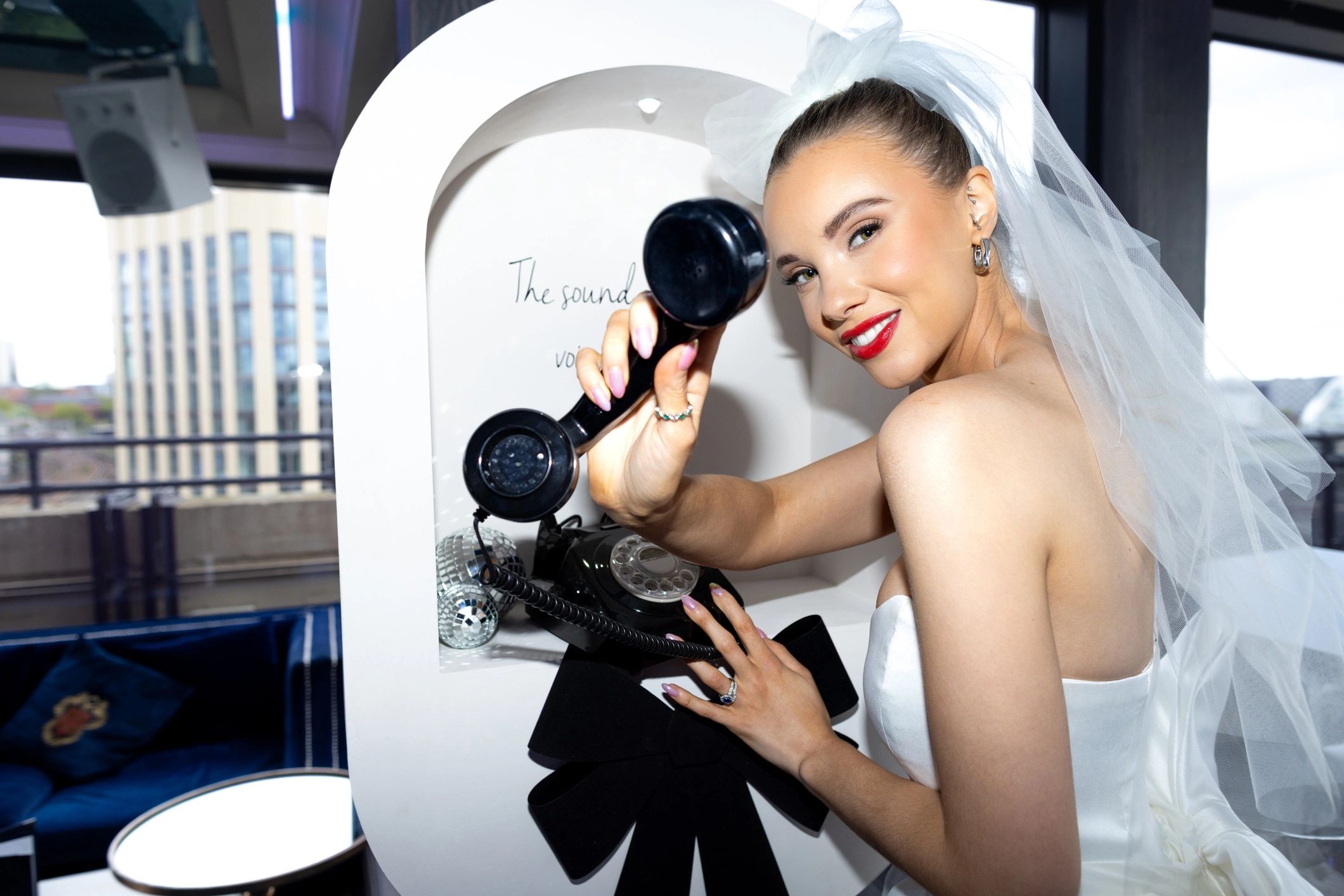 Bride in wedding dress styled with jewellery
