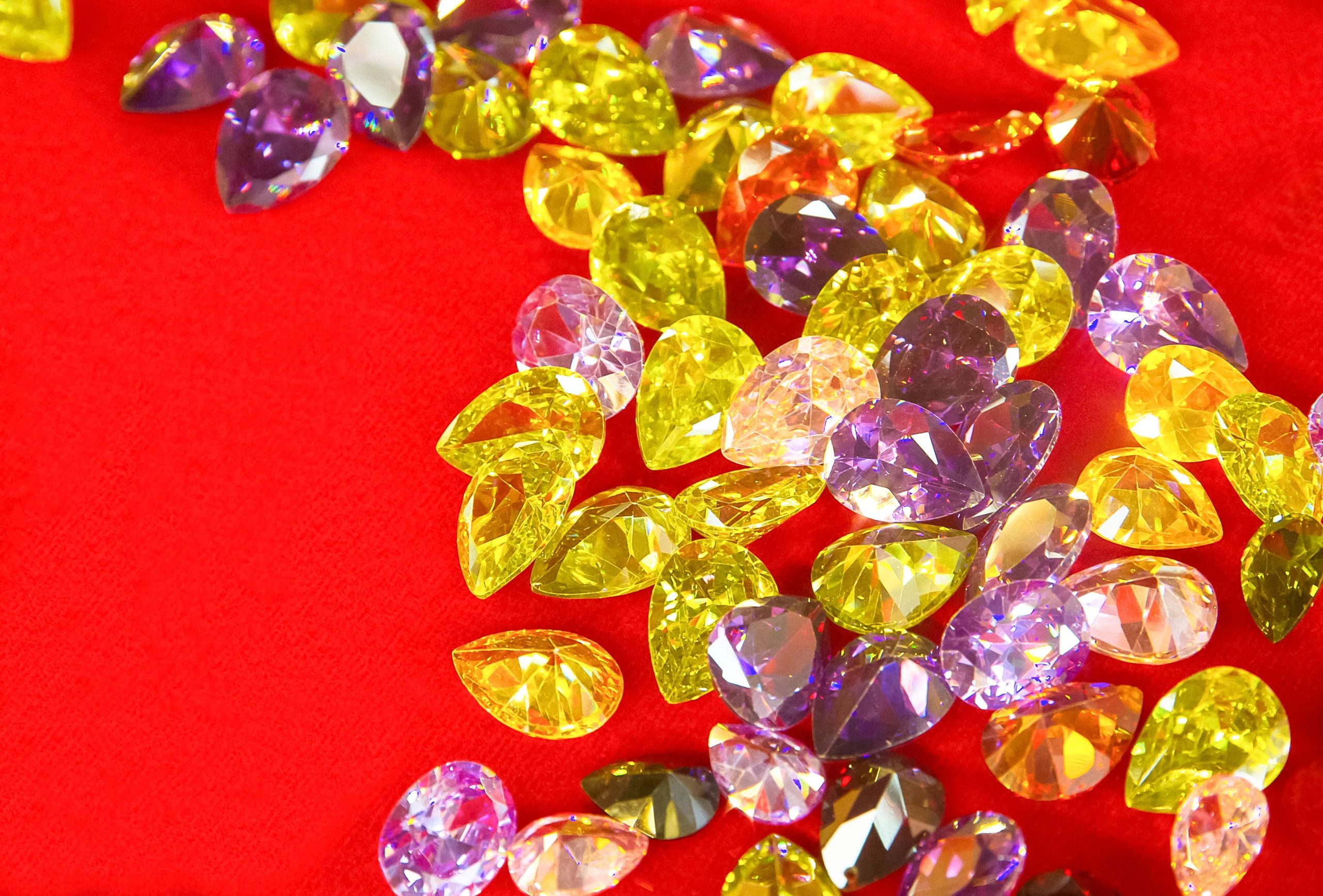 Sparkling jewellery display on rich background